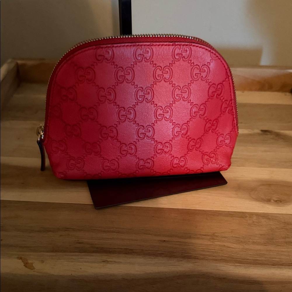 Gucci Guccissima red leather cosmetic pouch, model 431409